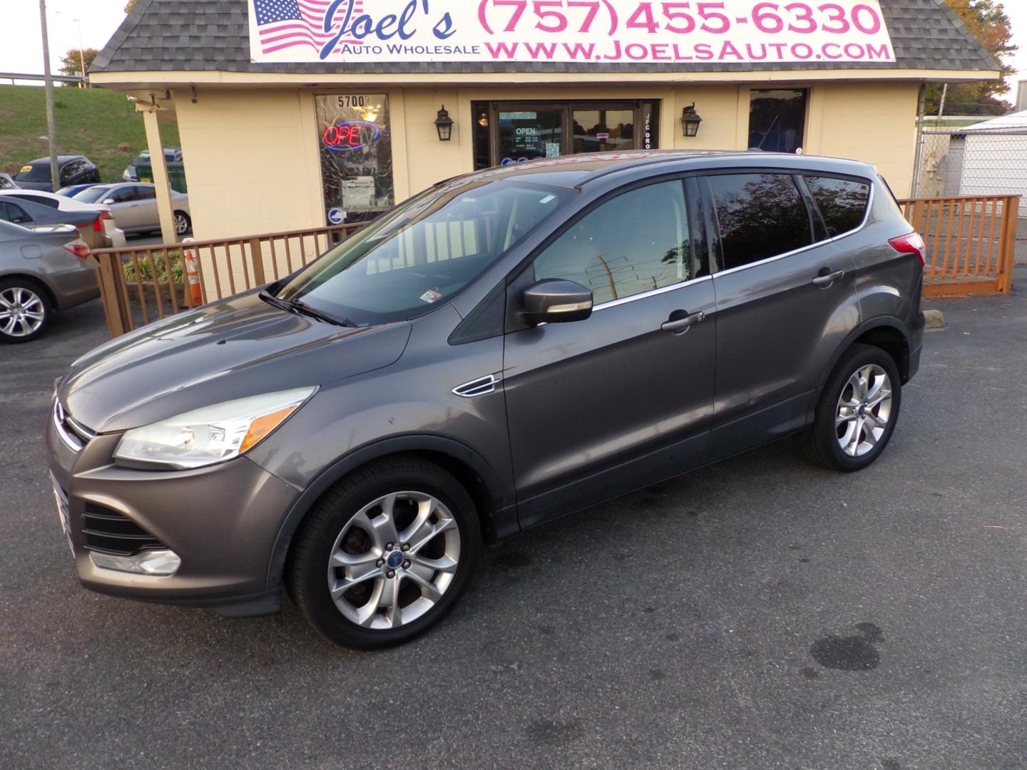 2013 Grey Ford Escape SEL FWD (1FMCU0H96DU) with an 2.0L L4 DOHC 16V engine, 6-Speed Automatic transmission, located at 5700 Curlew Drive, Norfolk, VA, 23502, (757) 455-6330, 36.841885, -76.209412 - Photo#0